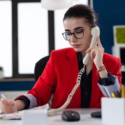 Sales representative making cold calls to generate solar leads